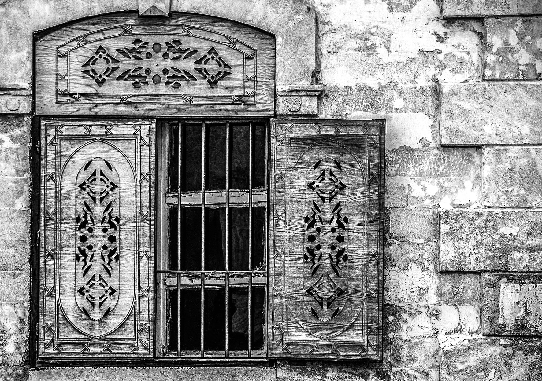 Ancient window near the mosque. Aleppo, Syria